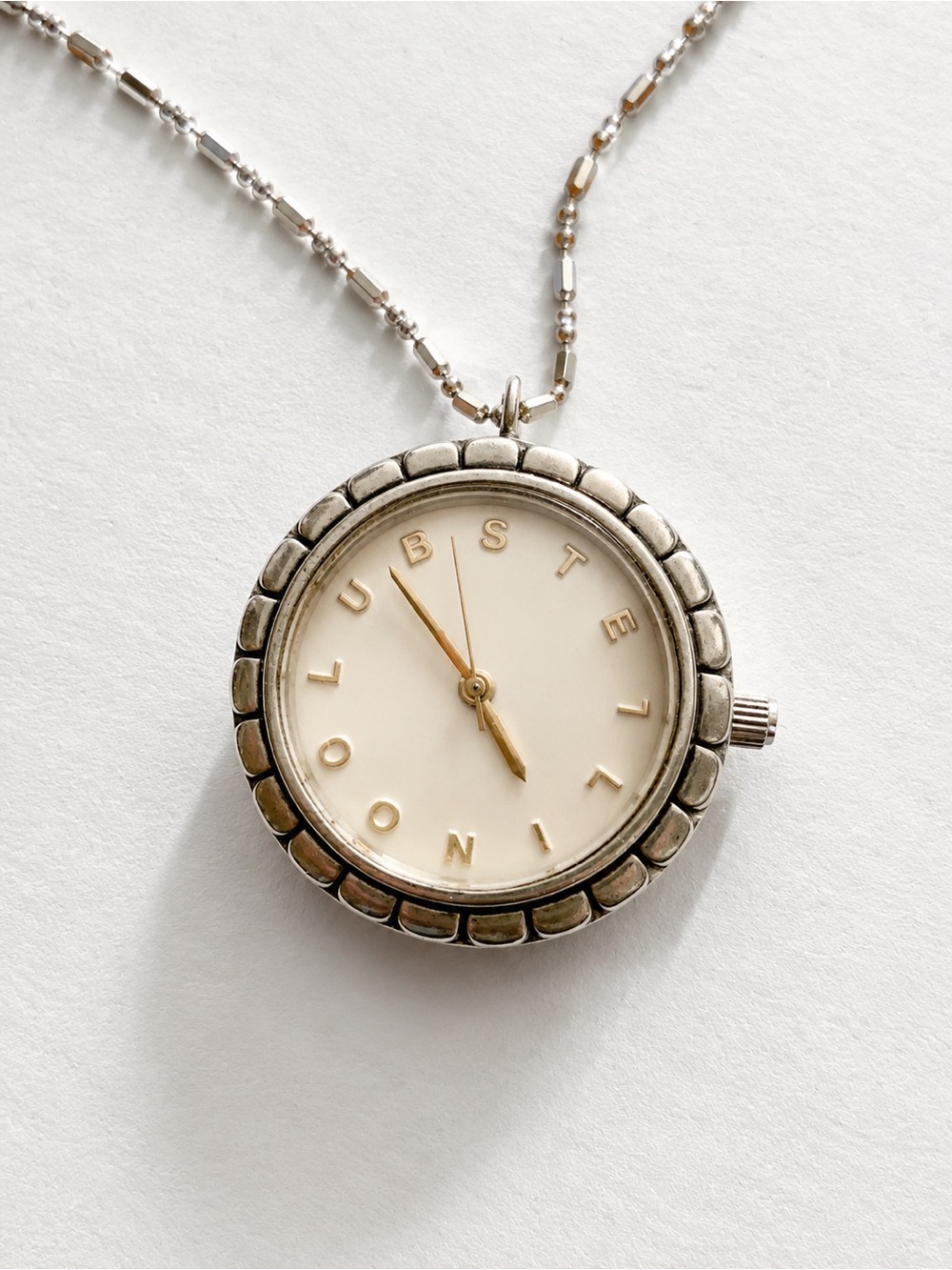 Vintage-Inspired Silver and Gold Watch Pendant Necklace in Cream